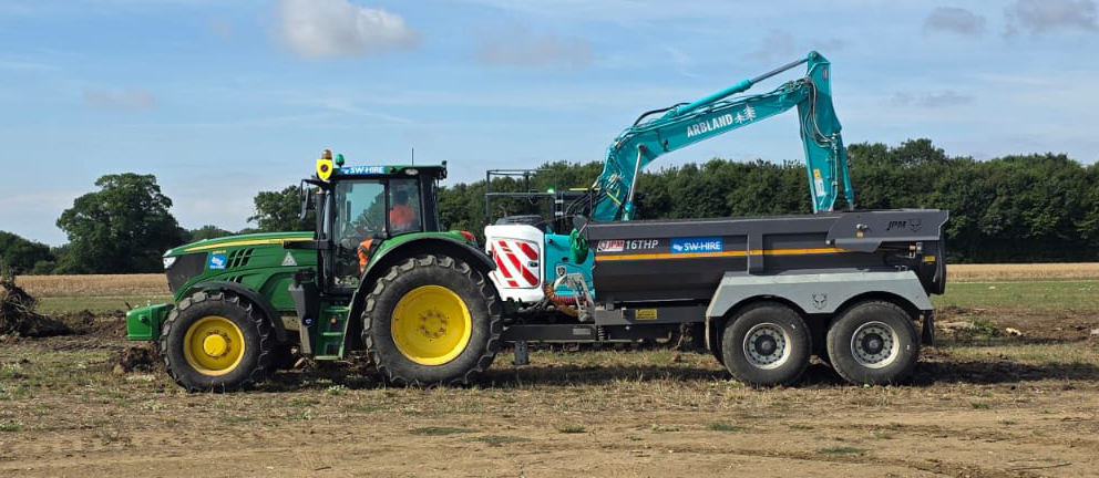 john deere tractor with safety shield and 16t dump trailer